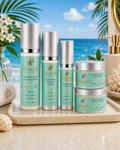 A complete 5-piece luxury evening skincare routine set from the Frolana Natural Overnight Architect collection. The premium white airless bottles and elegant glass jars feature soft teal labels and champagne metallic pumps or accents. The collection is arranged on a light beige textured tray against a bright, out-of-focus tropical beach and palm background, containing the Soft Renewal Cleansing Milk, Bakuchiol Restoring Serum, Restorative Eye Cream, Growth Factor Night Cream, and Neck & Décolleté Sculpting 