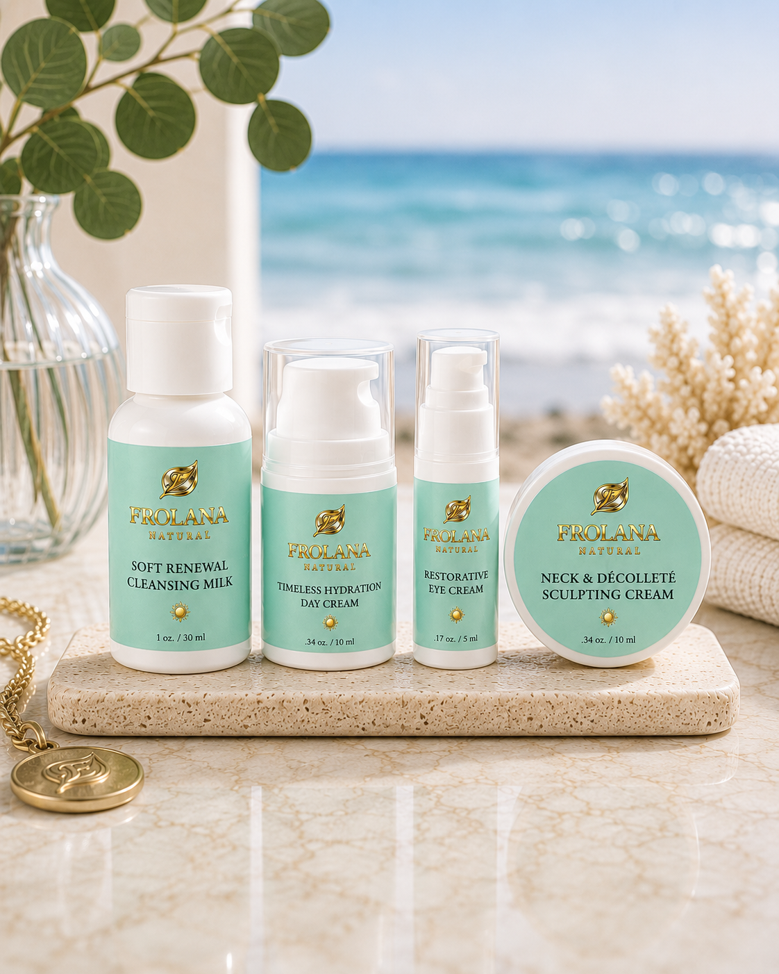 Frolana Natural Discovery Kit four-piece travel skincare set on a coastal counter at sunset